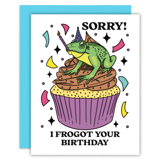 A green frog sitting on a chocolate frosted cupcake with confetti around. The text says sorry I frogot your birthday on a greeting card.