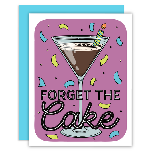 A brown espresso martini with a blue and green candle sticking out of it on a purple background with decorative text that says forget the cake on a greeting card with a blue envelope.