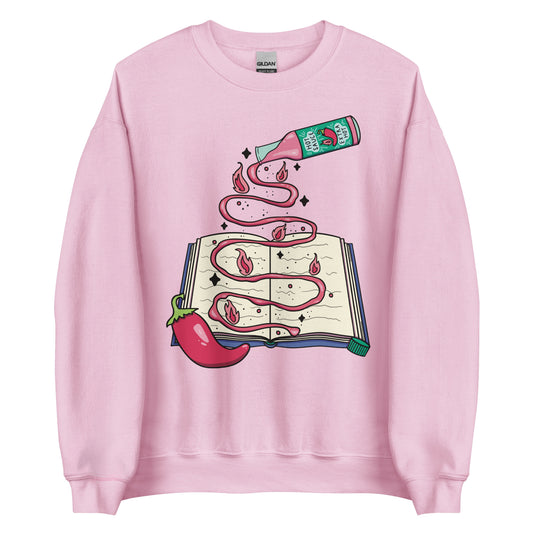 Hot sauce spicy books sweatshirt in color pink, pink hot sauce over book, keywords: bookish sweatshirt, spicy books, smut reader, romance book sweater, book lover gift, dark romance sweatshirt, fantasy romance hoodie