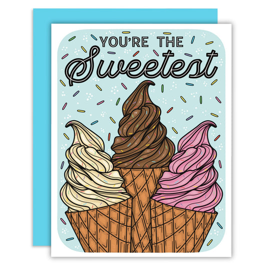 Text that says you’re the sweetest with three soft-serve swirl ice creams in strawberry, chocolate, and vanilla. Sprinkles are used as decoration on card background