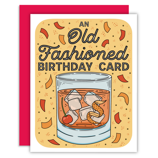 An old fashioned cocktail illustration on a yellow background with decoration and text that says “An Old Fashioned Birthday Card” in a black and white decorative font.