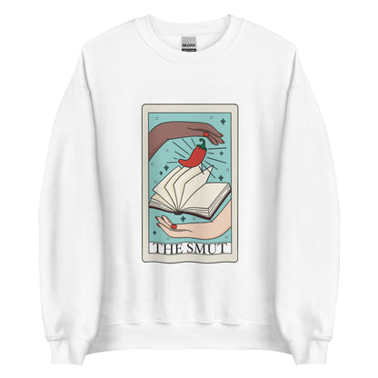 The smut tarot card sweatshirt in color white, two hands with book and chilli pepper on tarot card with text that says the smut. Keywords: bookish, bookworm, fantasy romance, dark romance, spicy books, smut reader,